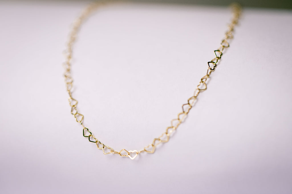 Elegant gouden collier met hartjes - Lara Boulangerie