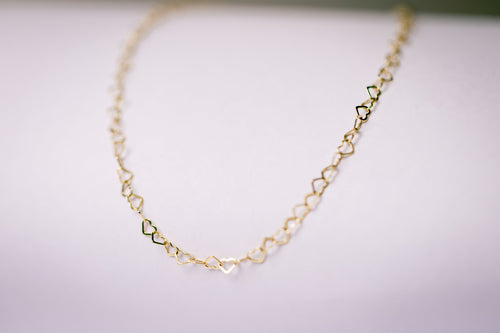 Elegant gouden collier met hartjes - Lara Boulangerie