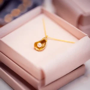 perle-d-huitre-goud-product-foto