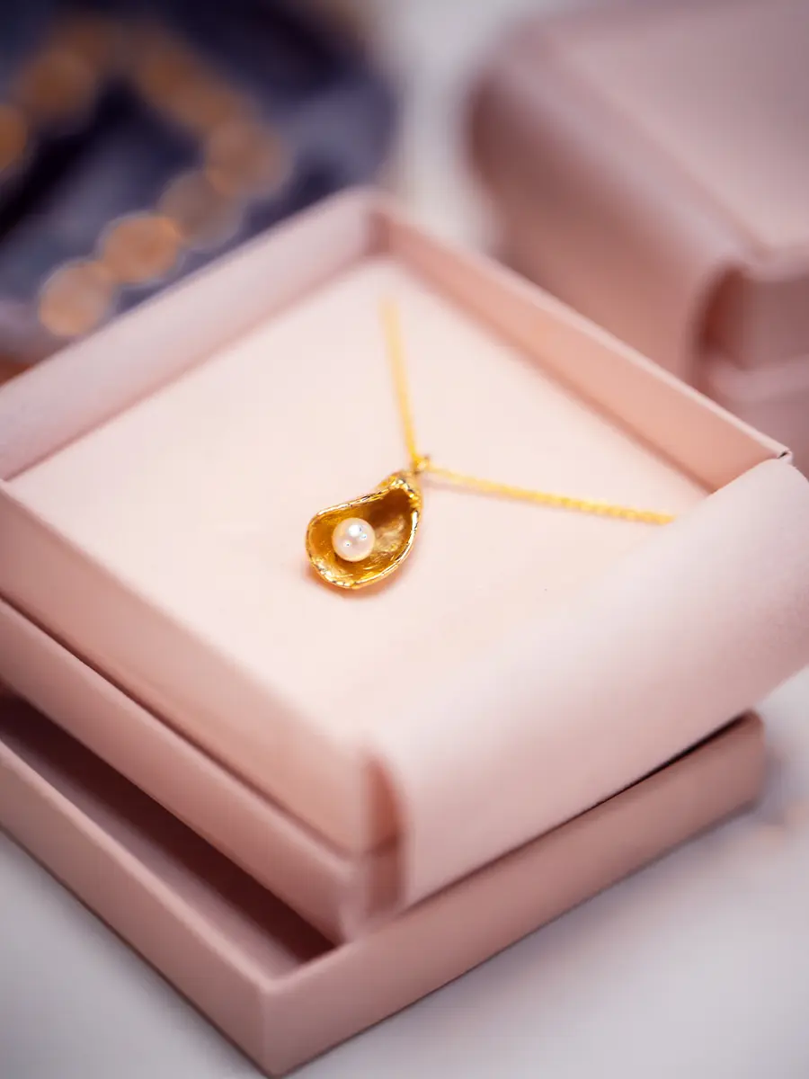perle-d-huitre-goud-product-foto